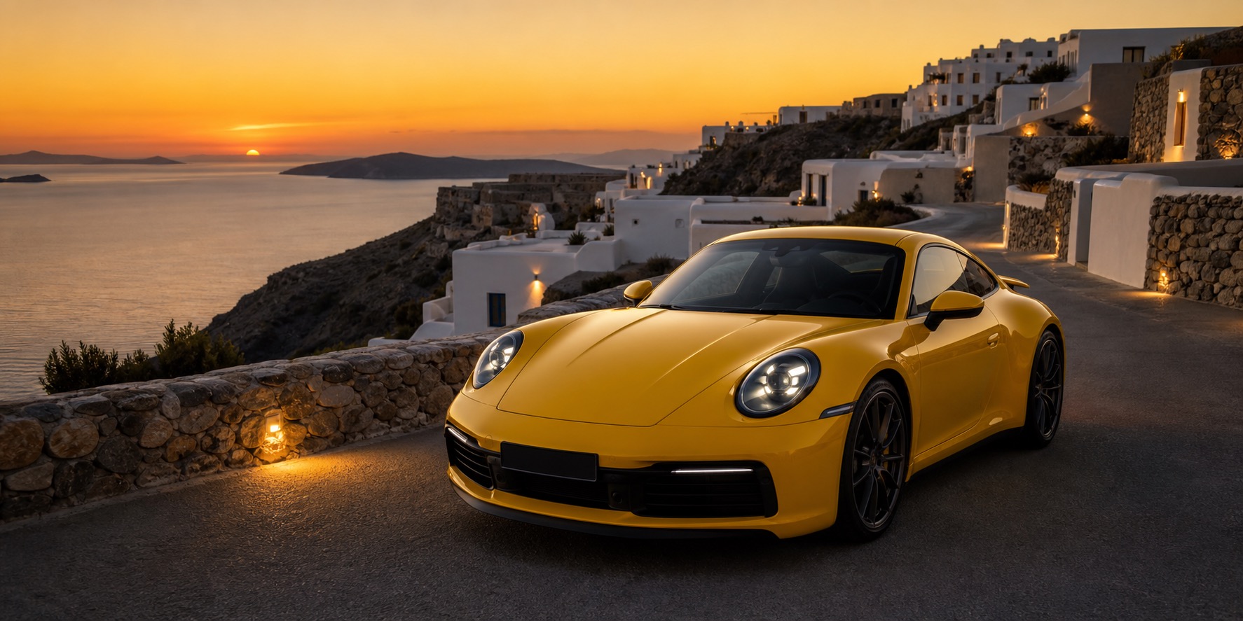 Porsche 911-style sports coupe on a Greek coastal road at golden hour